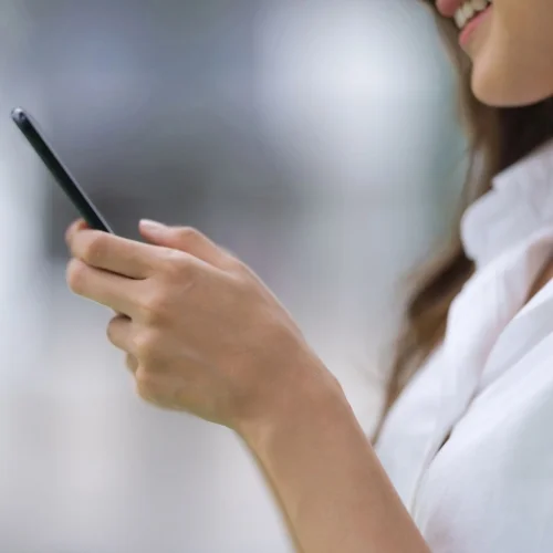 Woman using smartphone.